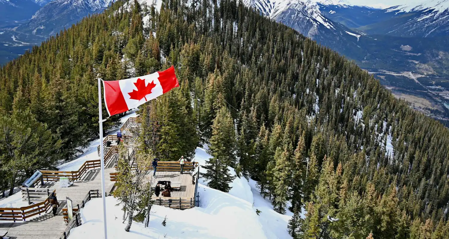 Flag-of-Canada-on-Hilltop-at-Banff-National-Park