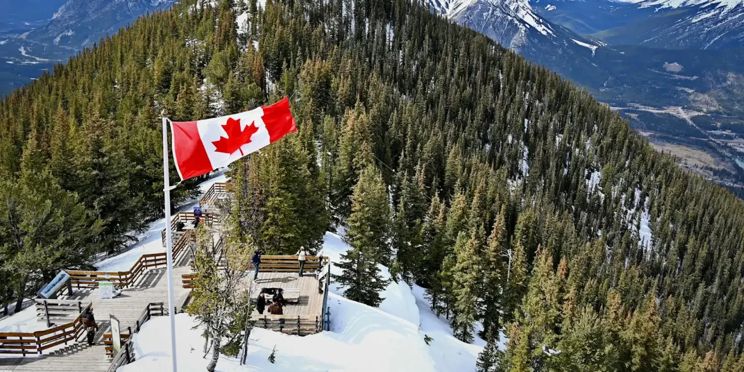 Flag-of-Canada-on-Hilltop-at-Banff-National-Park