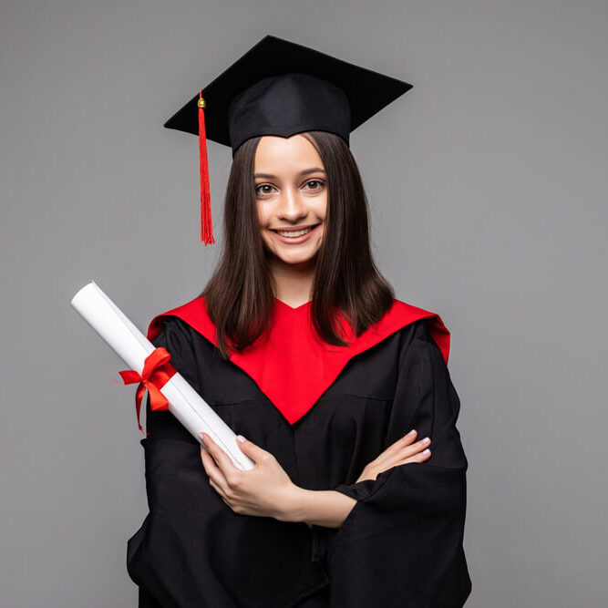 happy-student-with-graduation-hat-diploma-grey