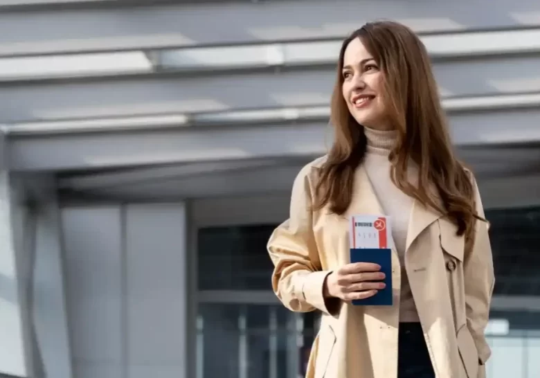 simling lady at the airport